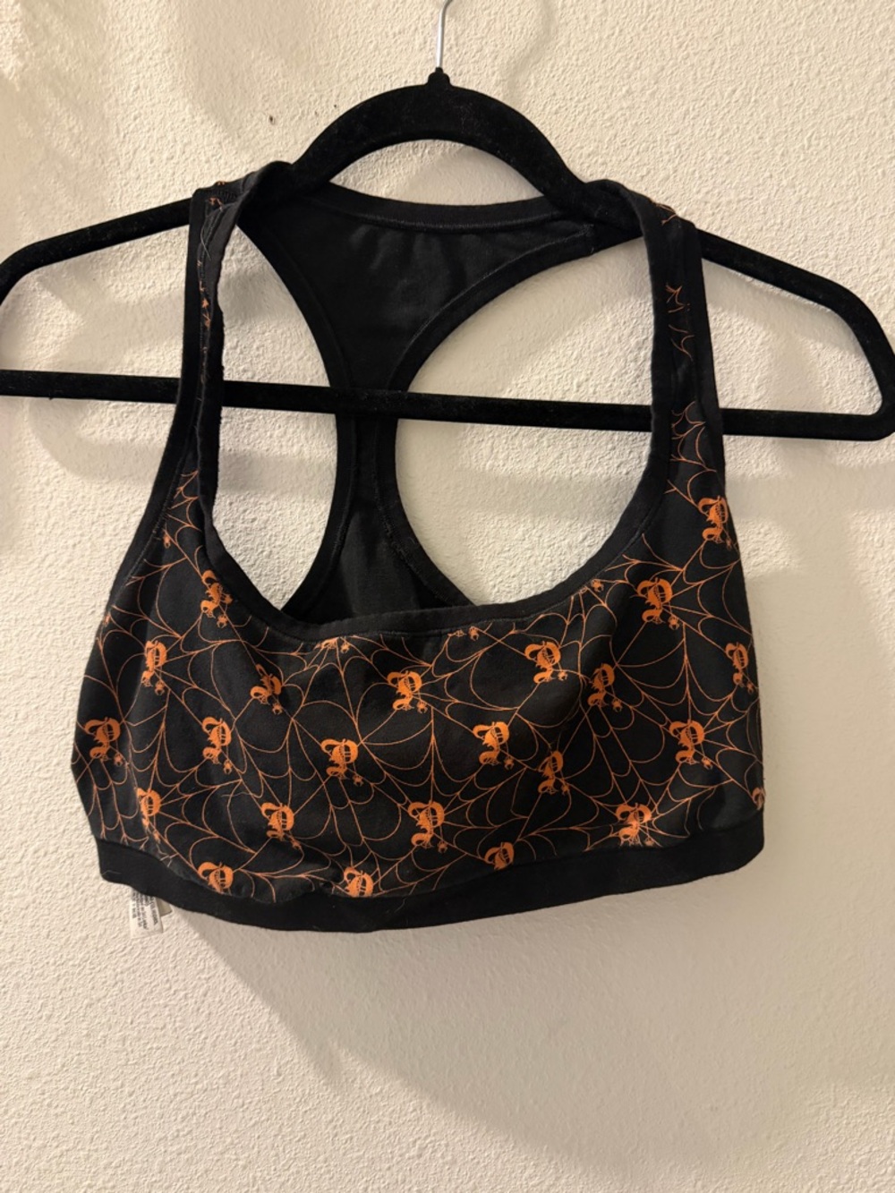 PINK Victoria's Secret Black Sports Bra with Orange Spiderweb Print